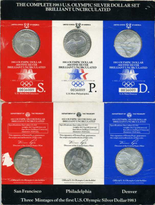 США набор из трех монет по 1 доллару 1983 буквы S, P, D, Олимпийские игры в Лос-Анджелесе, дискобол, в оригинальном картонном буклете все три монетных двора KM 209 серебро BUNC 2-5-1-01